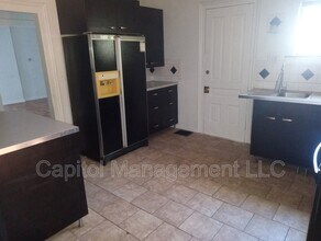 1126 Seymour Ave in Lansing, MI - Building Photo - Building Photo