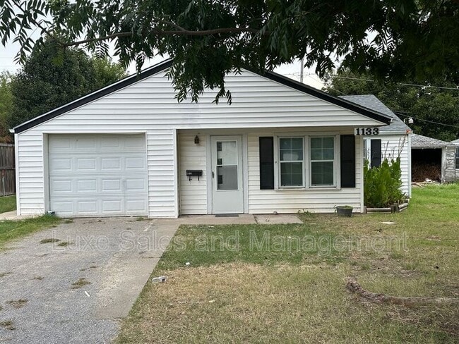 property at 1133 S Miles Ave
