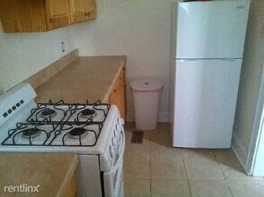 1105 Walnut Ave-Unit -Apt 1 in Baltimore, MD - Building Photo - Building Photo