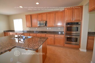 7008 Puetollano Dr in North Las Vegas, NV - Building Photo - Building Photo