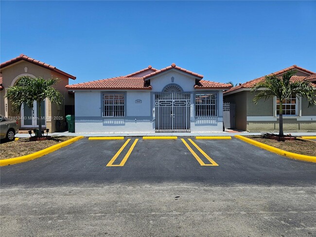 property at 8905 NW 121st St