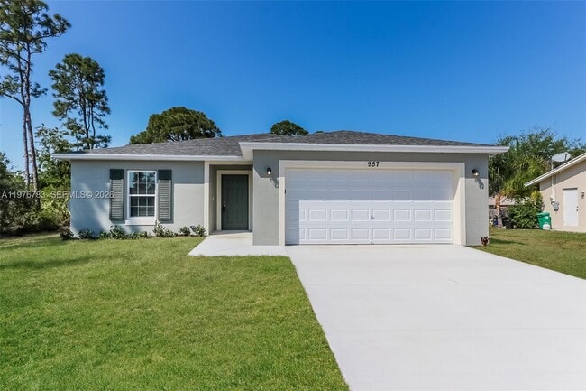 property at 957 SE Caravan Ave