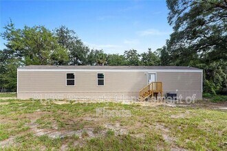 16364 SE 57th St in Ocklawaha, FL - Foto de edificio - Building Photo