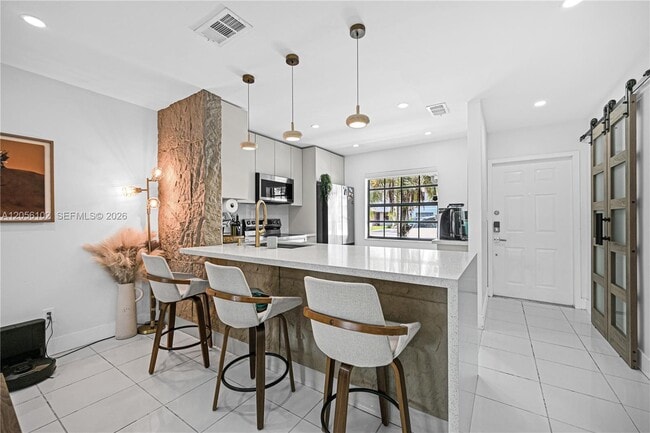 property at 10372 NW 3rd St