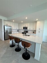 5555 Double Eager Cir in Ave Maria, FL - Building Photo - Building Photo