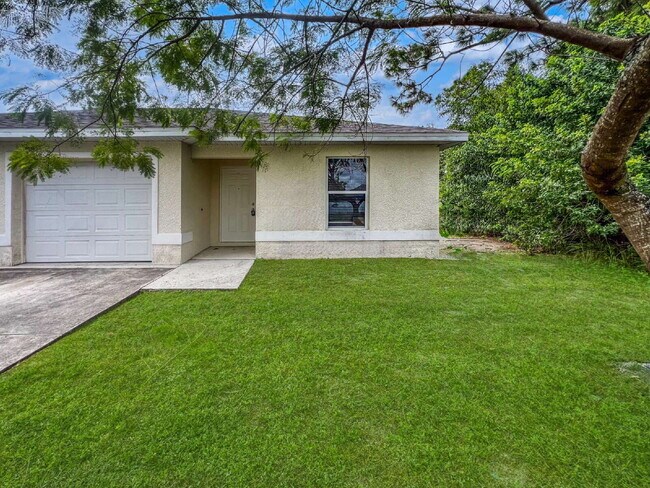 4987 28th St SW in Lehigh Acres, FL - Foto de edificio - Building Photo