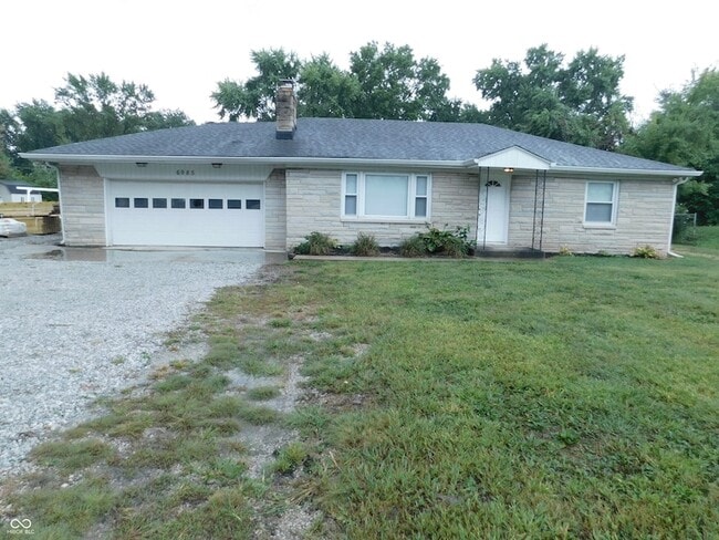 property at 6985 E County Rd 100 S
