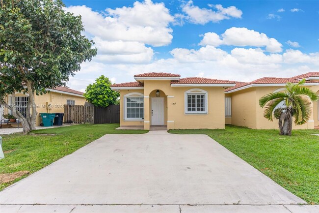 property at 12213 SW 214 Ln