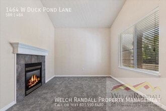 1464 W Duck Pond Ln in Taylorsville, UT - Building Photo - Building Photo