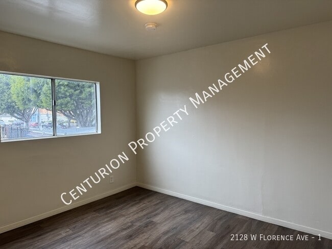 2128 W Florence Ave in Los Angeles, CA - Building Photo - Building Photo