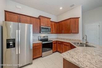 2542 Pinwherry St, Unit 107-02 in Palm Bay, FL - Building Photo - Building Photo