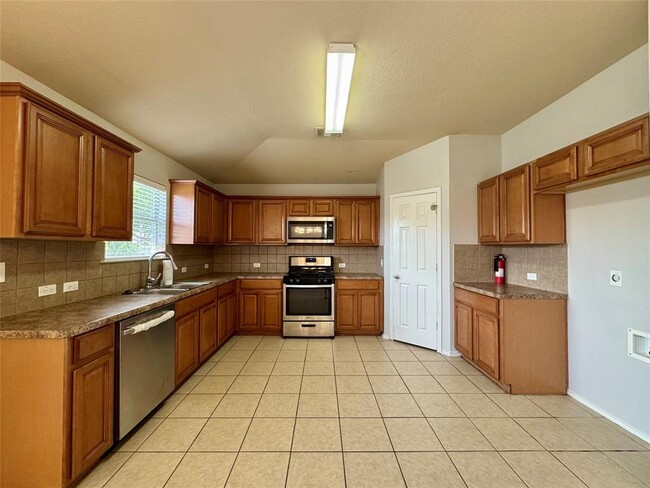 14828 Falling Stone Ln in Pflugerville, TX - Foto de edificio - Building Photo