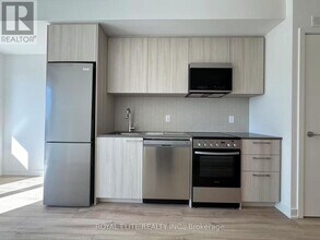 7439 Kingston Rd in Toronto, ON - Building Photo - Building Photo