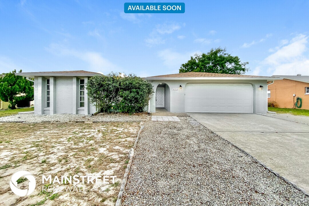 4153 Woodtrail Blvd in New Port Richey, FL - Building Photo