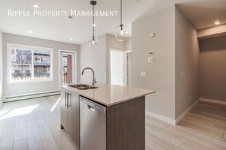 6 Merganser Dr W in Chestermere, AB - Building Photo - Building Photo
