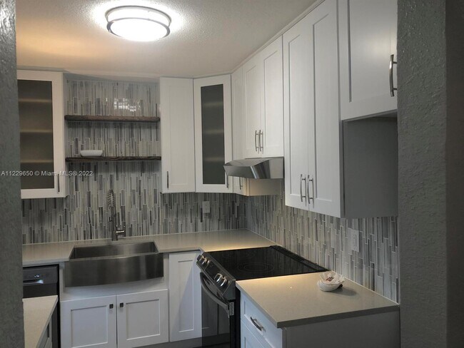 813 Hummingbird Way-Unit -4A in North Palm Beach, FL - Building Photo - Building Photo