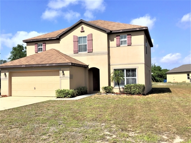 1612 Redfin Dr in Poinciana, FL - Foto de edificio