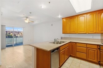 17888 Alburtis Ave, Unit A102-2 in Artesia, CA - Building Photo - Building Photo