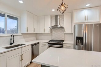 4090 W Wagon Trail Dr in Littleton, CO - Building Photo - Building Photo