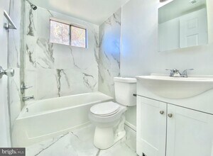 7700 Arehart Dr-Unit -1211 in New Carrollton, MD - Building Photo - Building Photo