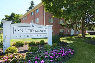 Country Manor Apartments in Webster, NY - Foto de edificio - Building Photo