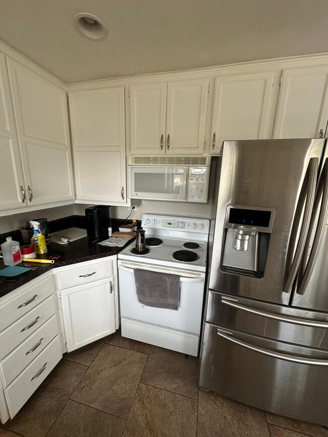 1385 Upham St in Lakewood, CO - Building Photo - Building Photo