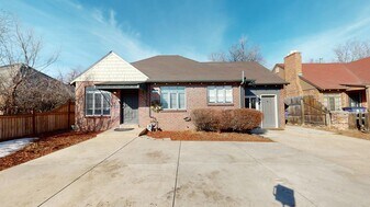 Bright & beautiful South Park Hill duplex property with large fenced shared yard in Denver, CO - Building Photo