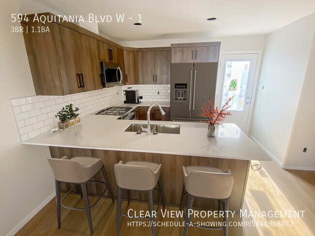 594 Aquitania Blvd W in Lethbridge, AB - Building Photo - Building Photo