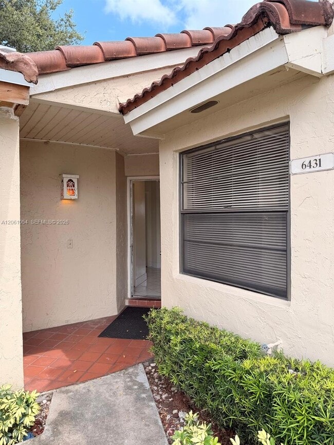 property at 6431 NW 171st St