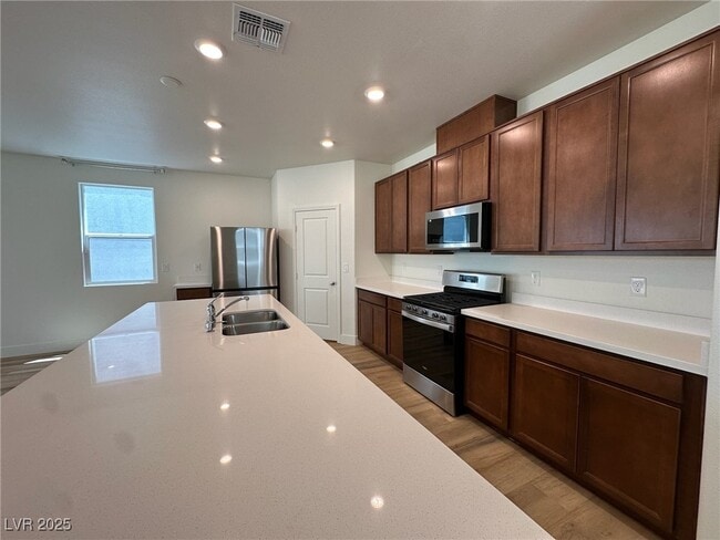 property at 6988 Sylmar Ave