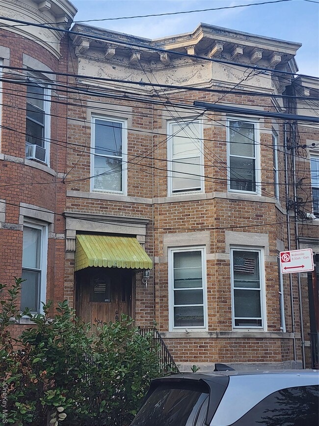 property at 60-19 Menahan St