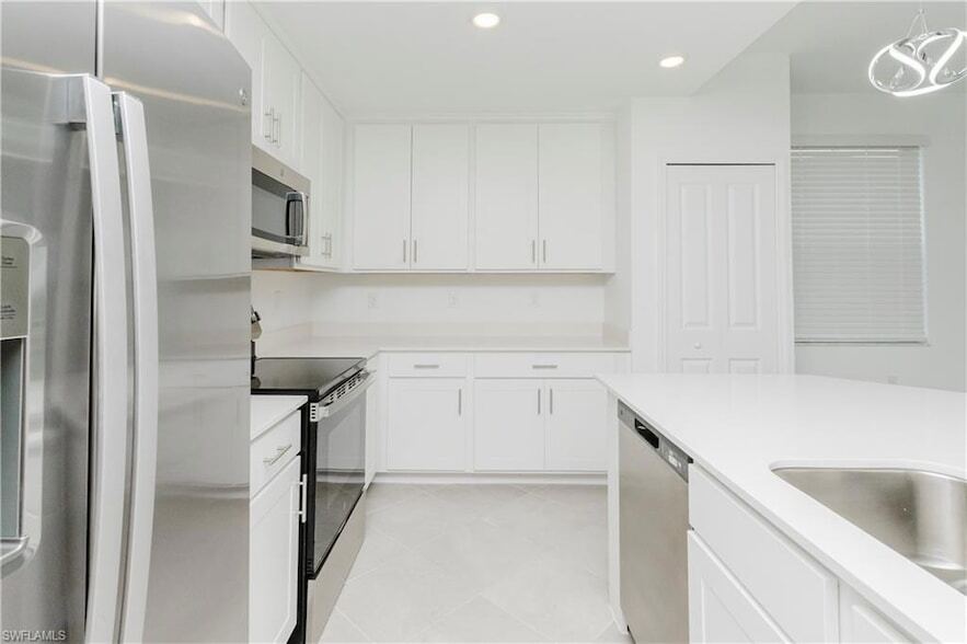 18461 Copperhead Ct, Unit 421 in Lehigh Acres, FL - Building Photo