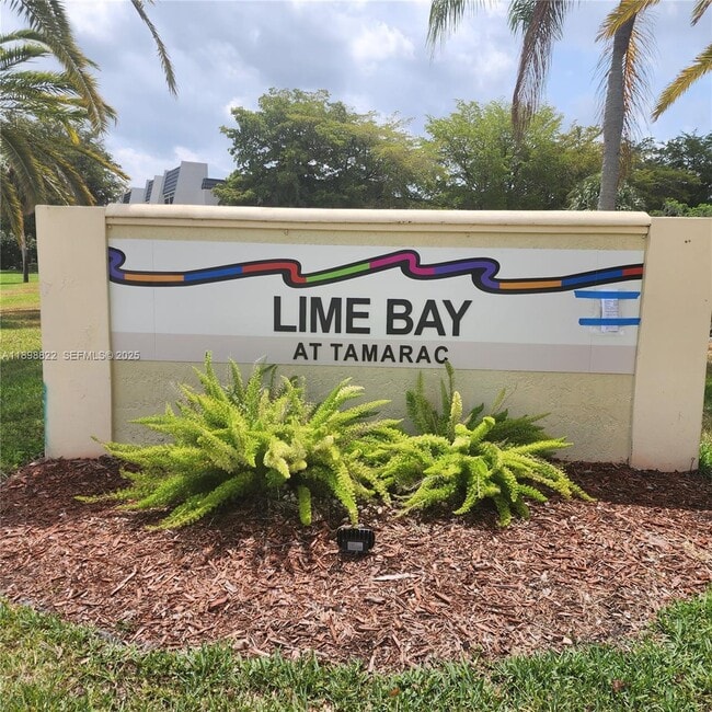 9101 Lime Bay Blvd in Tamarac, FL - Building Photo - Building Photo
