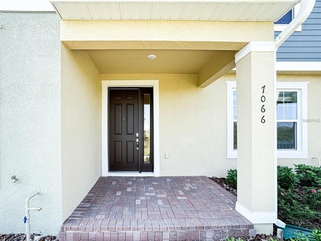 7066 Bolanzo Aly in Oakland, FL - Building Photo - Building Photo
