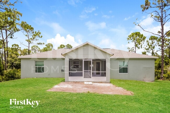 13057 Feldman Ave in Port Charlotte, FL - Foto de edificio - Building Photo