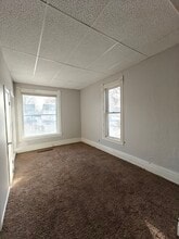 218 E Rose St, Unit APT 2 in Owatonna, MN - Building Photo - Building Photo