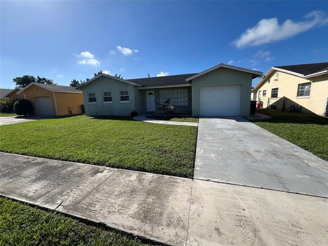 property at 9302 SW 1st Pl