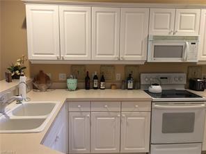 4844 Hampshire Ct-Unit -206 in Naples, FL - Foto de edificio - Building Photo