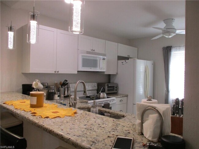 2684 Kings Lake Blvd, Unit 203 in Naples, FL - Building Photo - Building Photo