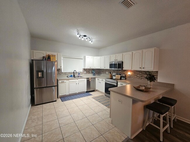 property at 825 Anastasia Blvd