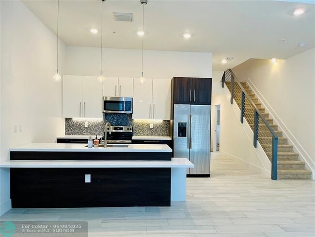 property at 4385 NW 9th St.