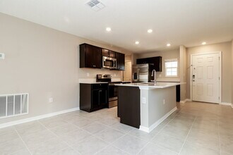 4295 Sunny Creek Pl in Kissimmee, FL - Foto de edificio - Building Photo