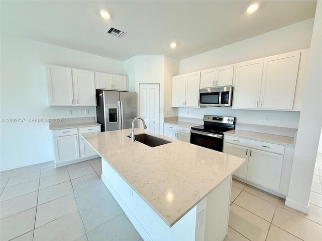 6939 Harbours Edge Ave in Greenacres, FL - Building Photo - Building Photo