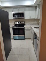 1524 SE Royal Green Cir, Unit Q102 in Port St. Lucie, FL - Building Photo