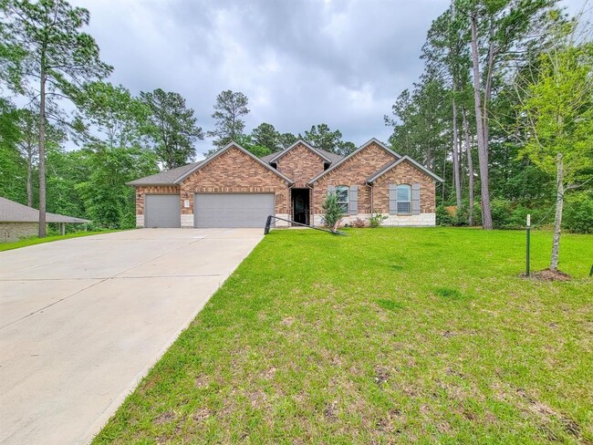 129 Jim Hall Ln in New Waverly, TX - Building Photo - Building Photo