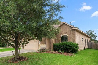 25426 Saddlebrook Champion Way in Tomball, TX - Building Photo - Building Photo