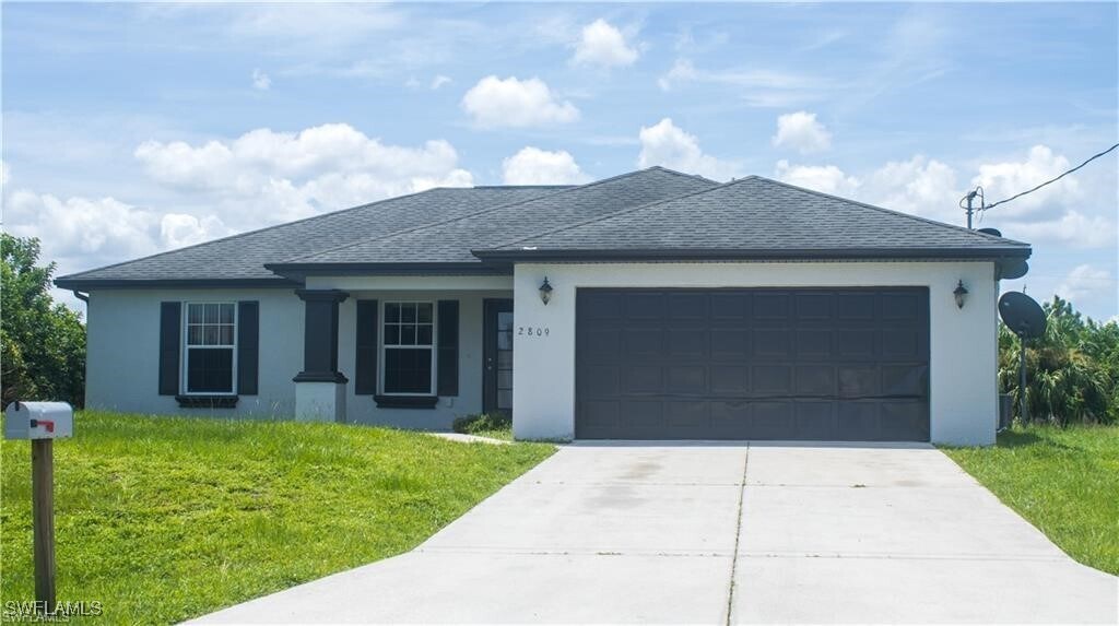 2809 58th St W in Lehigh Acres, FL - Building Photo