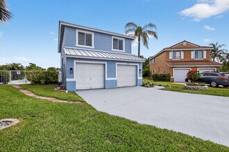 8225 Pelican Harbour Dr in Greenacres, FL - Building Photo - Building Photo