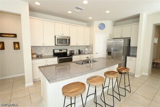 8484 Benelli Ct in Naples, FL - Building Photo - Building Photo