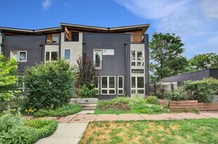 Contemporary Whittier home with wraparound deck in Denver, CO - Building Photo